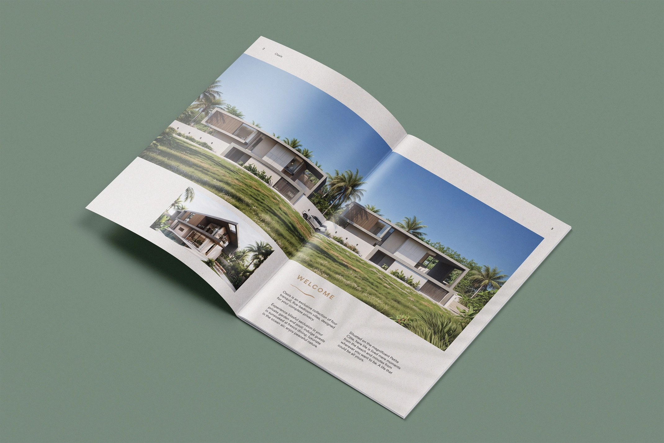 Open spread of the Dune Signature Oasis brochure, featuring a large photograph of the villas on a green lawn with palm trees against a blue sky. A smaller inset photograph shows a villa's interior. The word 'WELCOME' is visible in the bottom left corner, along with paragraphs of text. The brochure is shown at an angle on a grey-green background. This image showcases the luxury property brochure design, using high-quality architectural photography and a clean layout to highlight the villas' design and location.