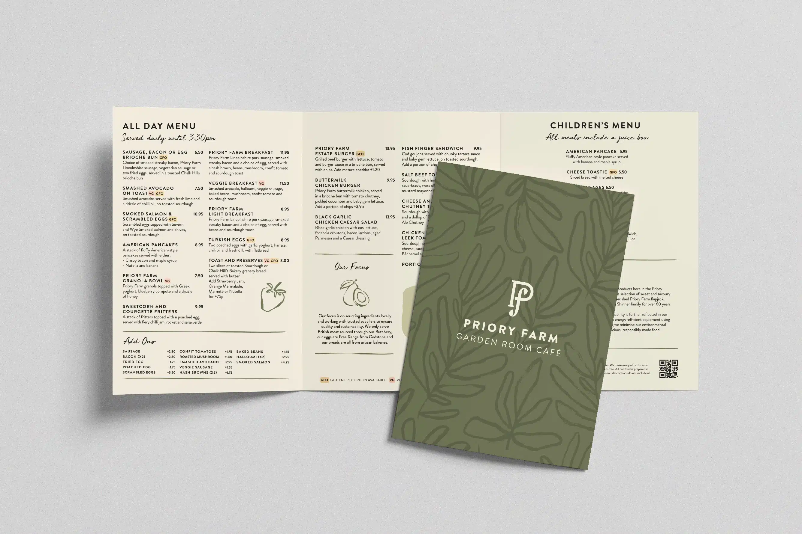 A visual of the Priory Farm Estate Garden Room Café menu, showing an open tri-fold menu with a list of food items and prices, and a separate card featuring the café's branding. The card has a green background with a leaf pattern and the Priory Farm 'P f' logo, along with the words 'GARDEN ROOM CAFÉ'.